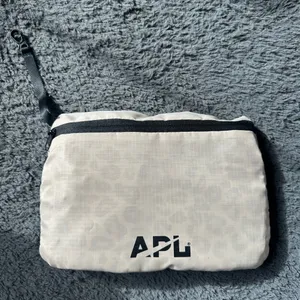 APL packable cream, black and leopard backpack thumbnail 1
