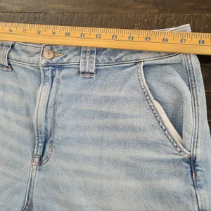 American Eagle Super High Rise Light Wash Cargo Baggy Wide Leg Jeans Womens 14 thumbnail 6
