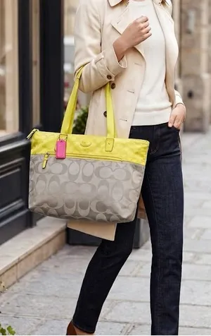 Y2K Coach Getaway Nylon Signature Tote in Yellow and Cream thumbnail 1