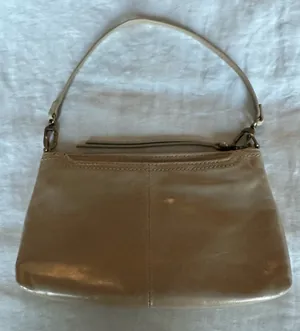 HOBO Darcy Convertible Crossbody. This elegant tan leather handbag is perfect for any occasion. Its sleek design and neutral color make it a versatile addition to your wardrobe. NWOT thumbnail 1