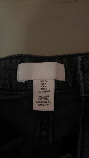 H&M black mid rise jeans thumbnail 3