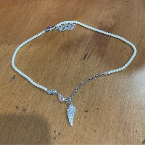 Juicy Couture Pam Gela Pearl and Silver Angel Wing Charm Necklace thumbnail 1