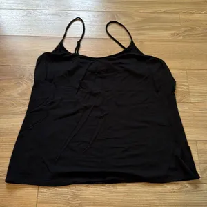 Black tank top with adjustable‎ straps size medium No brand tag but I think it thumbnail 1