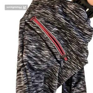 Athleta woman’s top with thumb hole and zip up pocket.‎ thumbnail 4