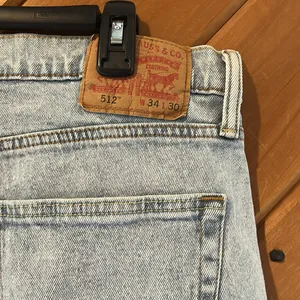Levi’s 512 slim taper fit light blue distressed jeans thumbnail 8