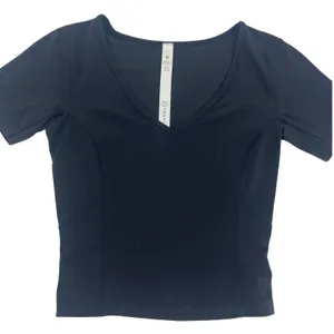Lululemon Nulu Cropped Slim Yoga Short Sleeve‎ Top Black Size 2 thumbnail 4