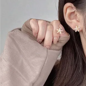 Gold Starfish Pearl Earrings thumbnail 2