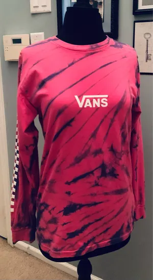 This is a pink and purple Vans tie-dye long-sleeve t-shirt featuring the brand's signature white logo on the chest. thumbnail 15