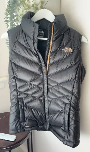 The North Face black puffer vest in size S thumbnail 1