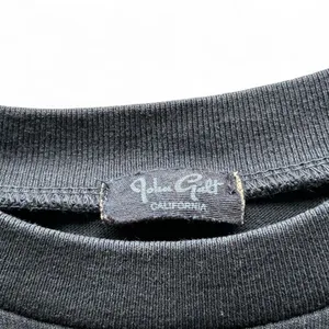 brandy melville john galt embroidered skeleton crop top thumbnail 4