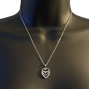 Vintage silver tone cubic zirconia double heart pendant necklace thumbnail 1