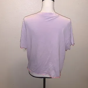 Nike Dri Fit pink Icon Clash loose fit crop top thumbnail 5