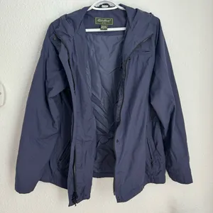 Eddie Bauer dark navy blue zip up rain jacket with hood women’s size L thumbnail 1