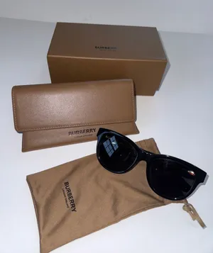 Burberry women’s Black Sunglasses with Brown Case and Pouch thumbnail 1