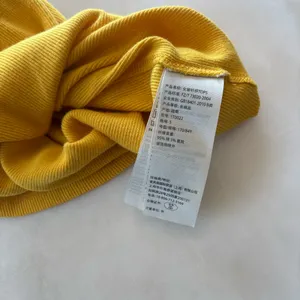 Y2K aesthetic with this classic vintage Abercrombie & Fitch tank top. This piece features a vibrant marigold yellow hue in a flattering, stretchy ribbed knit that's perfect for layering or wearing solo. thumbnail 3