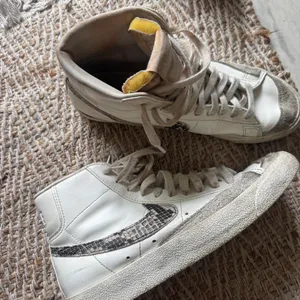 Nike Blazer Mid '77 white sneakers with black snake print swoosh, size US 9.5 thumbnail 1