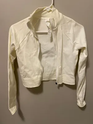 Fabletics cream  cropped jacket thumbnail 1