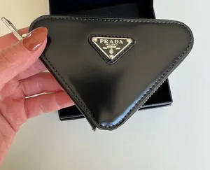 Prada Triangle-Shaped Mini Pouch in Black thumbnail 1