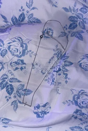 silver sideways diamond cross necklace thumbnail 1