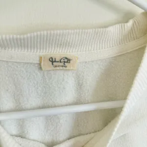 Brandy Melville White Sweatshirt with Blue Floral Design thumbnail 3