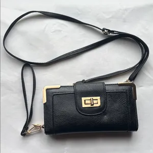 Elegant Black Leather Crossbody Bag GUC thumbnail 1