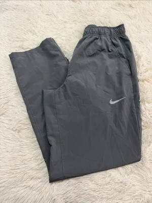 Nike Women's Charcoal Gray Track Joggers with Reflective Swoosh thumbnail 1