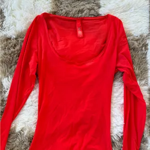 SKIMS Vibrant Red Long Sleeve Bodysuit thumbnail 1