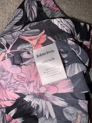 Flowy maxi Serong with an all-over pink floral pattern. Tie-waist detail for a customizable fit. Lightweight, breezy fabric for beach or pool wear. Feminine floral design ideal for vacation days. thumbnail 3