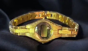 Vintage Quartz gold tone digital watch thumbnail 1