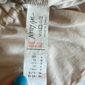 Nasty Gal size 4 cream colored top thumbnail 5