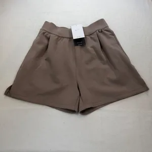 Nike Women's 24.7 ImpossiblySoft Dri-FIT 4'' Shorts HQ8179-233 Brown Large NWT thumbnail 3
