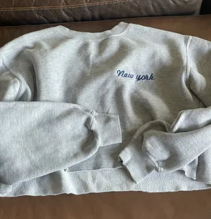 Brandy Melville Cropped New York Long Sleeve Sweater thumbnail 1