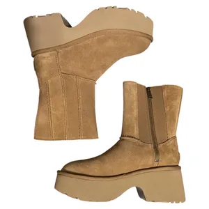 UGG suede boots with chunky platform sole. Side zipper and elastic for easy entry. Soft suede upper with clean stitching details. Neutral tan hue pairs with many outfits. thumbnail 1