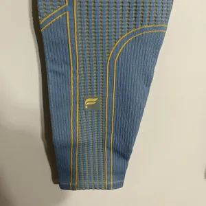 Fabletics Seamless High-Waisted Compressive Crop Leggings Size XL Blue &‎ Yellow thumbnail 10