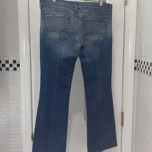 7 for All Mankind vintage boot cut denim. Distressed pockets. EUC. Size 30. thumbnail 2
