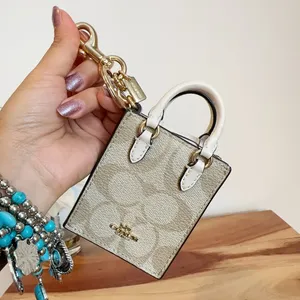 NWT Coach‎ North/South Mini Tote Bag Charm In Signature Canvas thumbnail 2