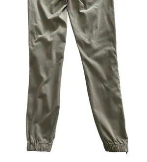 American Eagle -ARMY GREEN JOGGER PANTS-SIZE 2 Elastic waist with drawstring, zip front, two front and two back pockets, elastic ankles with a side zipper, excellent condition Measurements: Waist: side to side 13-16 inches Rise: 9 inches Inseam: 37 inches thumbnail 9