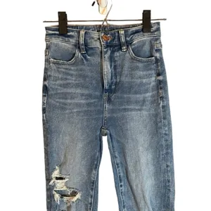American Eagle Women’s Blue Distressed Shark Bite Fringe Denim Jeans Size 0R thumbnail 3