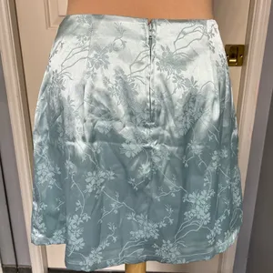 Francesca’s Blue Rain‎ Floral Embossed Satin Mini Skirt thumbnail 3