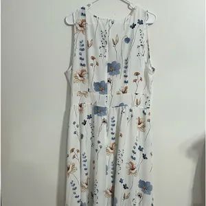 White dress with flowers. Used but in good condition. Size 14 thumbnail 5