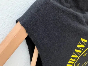 Nirvana Smiley Face Band Tee Black Off-the-Shoulder T-Shirt thumbnail 4