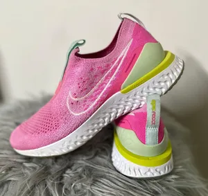 Nike Women’s Epic React Flyknit Running Shoes thumbnail 1