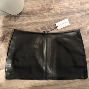 We Wore What Black Vegan Leather Mini Skirt with Silver Zipper thumbnail 6