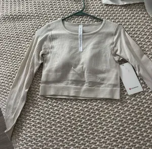 Lululemon Ebb to Street Cropped Long Sleeve thumbnail 1