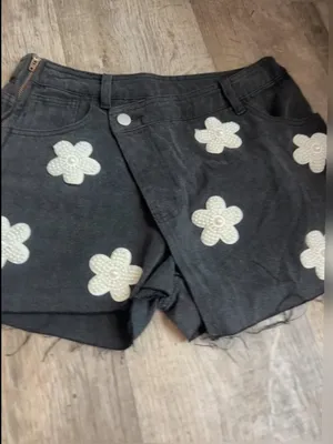 POL black denim skort features distinctive pearl-embellished flower details thumbnail 2