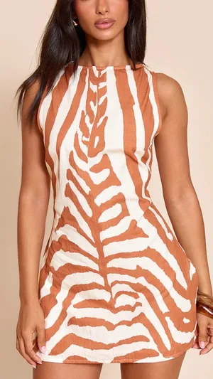 PrettyLittleThing White and Tan Zebra Print Mini Dress thumbnail 1