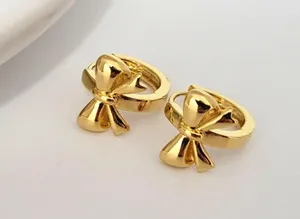 Gold Bow Chunky Hoops thumbnail 2