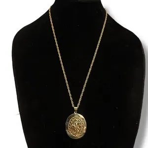 Vintage gold tone oval filigree locket pendant necklace thumbnail 1