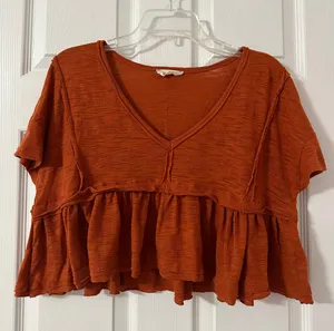 Urban Outfitters V-Neck Peplum Top thumbnail 1