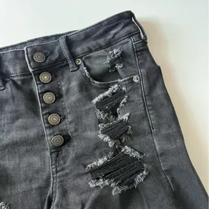 American Eagle • Distressed Washed Black Button Fly Super High Rise Shorties thumbnail 2